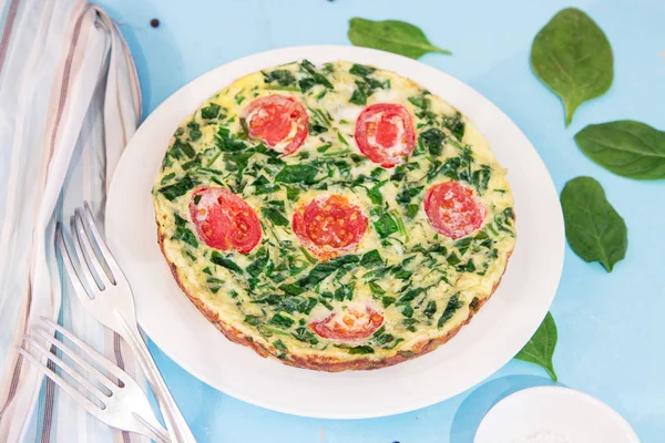 Spinach Frittata Italian Omelet Cherry Tomatoes White Plate Blue Background — Stock Photo, Image
