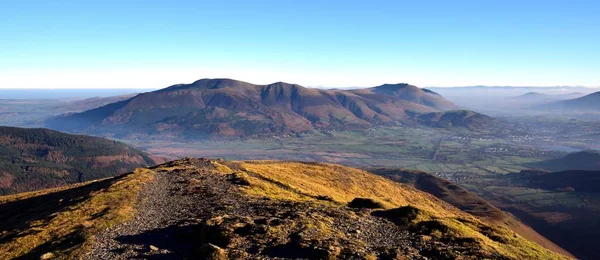 Sonnenlicht auf Schleudersitz und Blencathra — Stockfoto