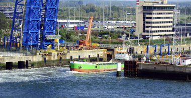 Vlaanderen 8 transiting the Port locks under its own power clipart