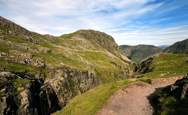 Sunlight on the track at Piers Gill — Stock Photo, Image