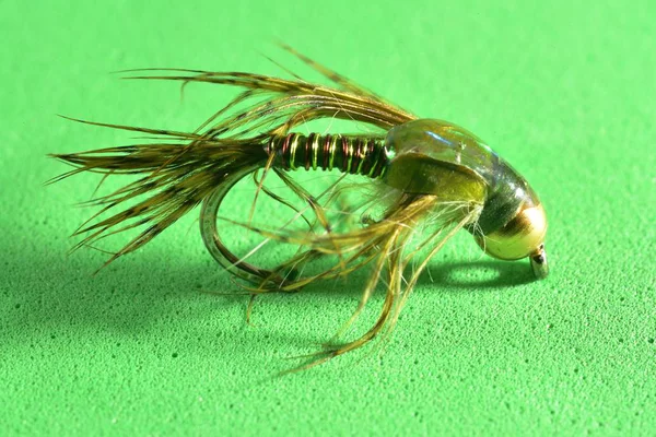 Koperen John Trout Fly imitatie — Stockfoto