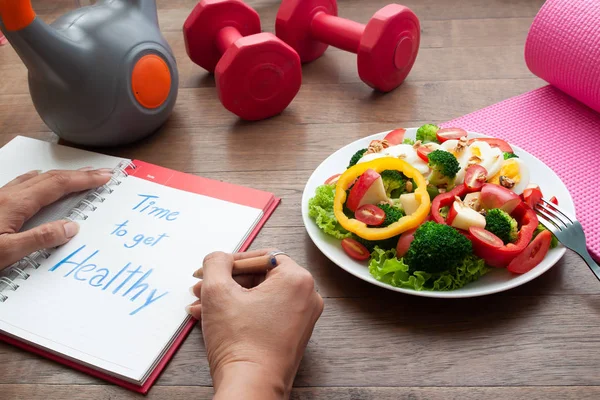 Woman Writing Diary Book Salad Fitness Equipments Table Dieting Concept — Stock Photo, Image