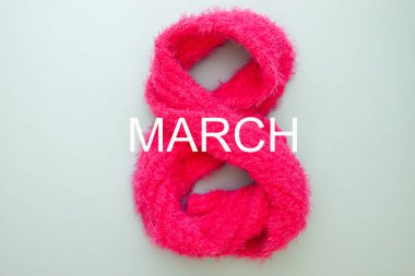 Kadının gün kavramı. Pembe eşarp yapılan sekiz numara. 8 Mart
