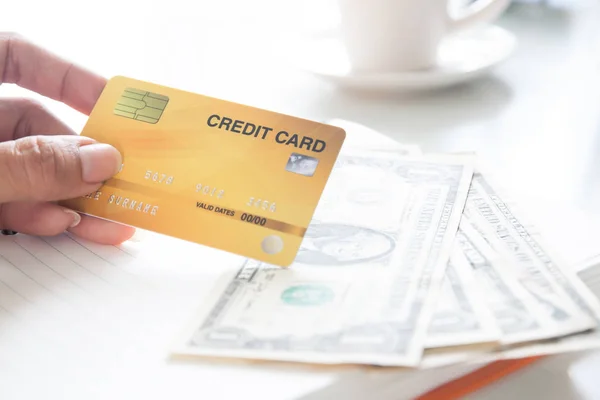 Woman hand holding plastic credit card. Business and e-payment concept — Stock Photo, Image