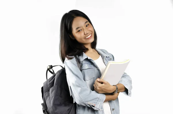 Uma jovem estudante asiática com o fundo branco — Fotografia de Stock