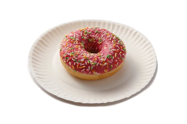 Sweet doghnut in glaze decorated with sprinkles — Stock Photo, Image