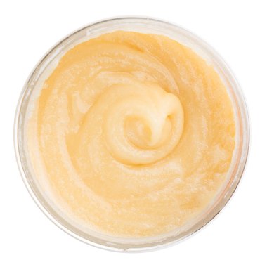 Çiğ çırpılmış yaban çiçeği bal kavanozunun üst görünümü