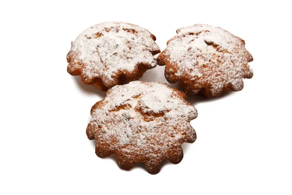 Skupina muffinů posypané práškovým cukrem — Stock fotografie