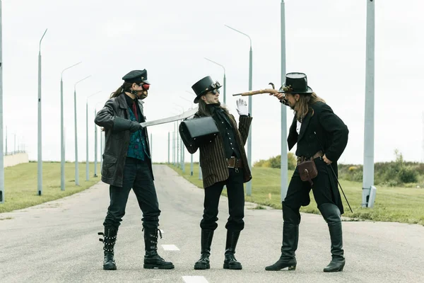 Three Mans Steampunk Style Stage Robbery Road — Stock Photo, Image