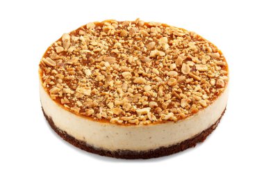 Beyaz arka planda izole edilmiş fıstıklı cheesecake serpiştirilmiş New York tarzı. Tam peynirli tart. Ev yapımı kremalı peynirli kek..