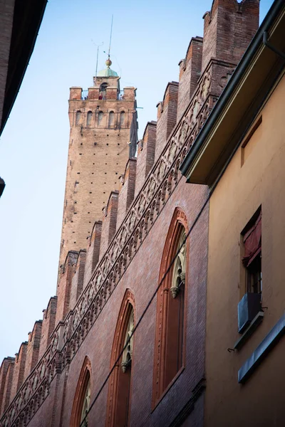 Palazzo Pepoli, home of the Museum of History of Bologna, Italy. In the background is the Torre degli Asinelli, a commonly recognized symbol of Bologna.