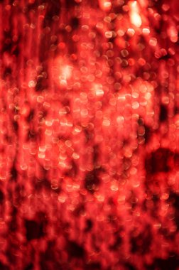 Defocused kırmızı renkli ışıklar doku arka plan soyut