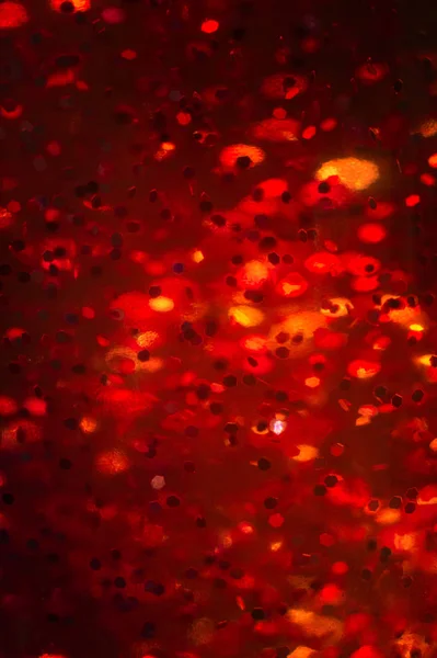 Lavalampe in der Nacht auf rotem Hintergrund — Stockfoto