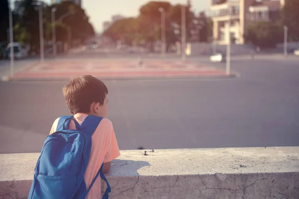 Back to school first day kid carrying backpack walking up school stairs — ストック写真