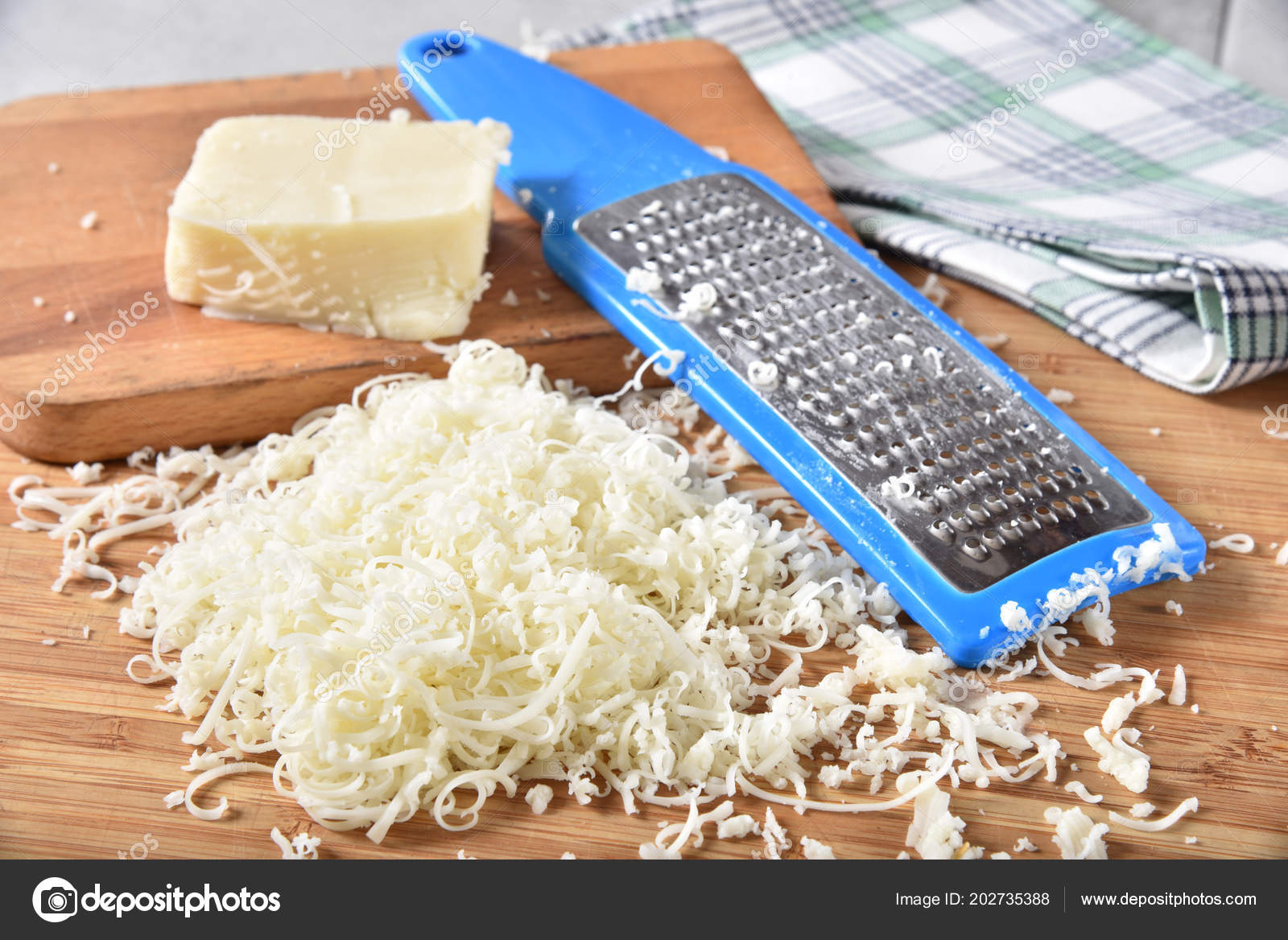 Small Grater For Parmesan Cheese Grater Stock Photo - Download