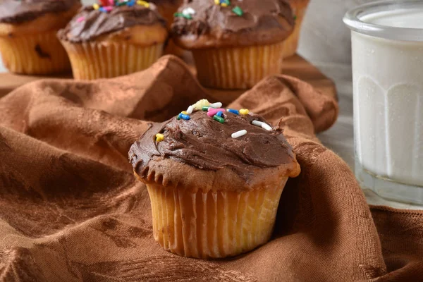 Delicious Home Baked Yellow Cupcakes Chocolate Frosting Mulit Colored Candy — Stock Photo, Image