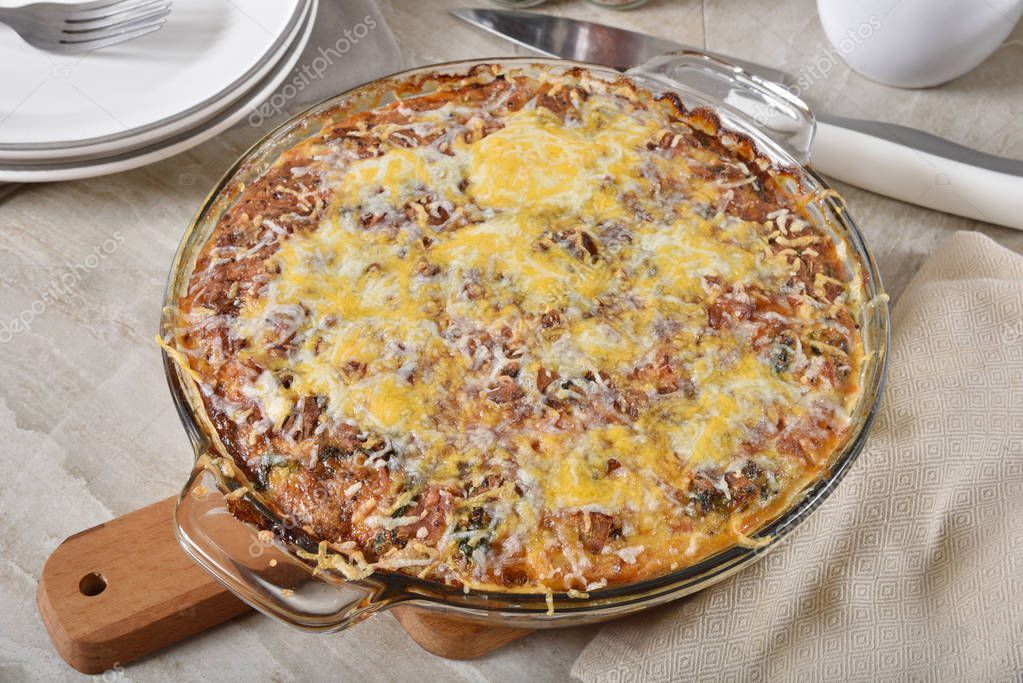 Quiche saludable sin gluten con jamón, queso, quinua, espinacas y col