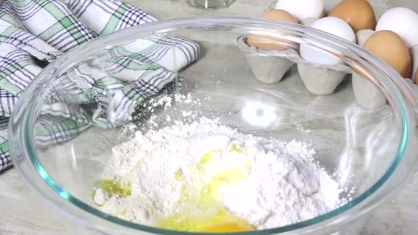 Two Eggs Dropping Bowl Dry Ingredients — Stock Video