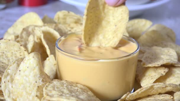 Dipping Tortilla Chip Cheese Sauce Slow Motion — Stock Video