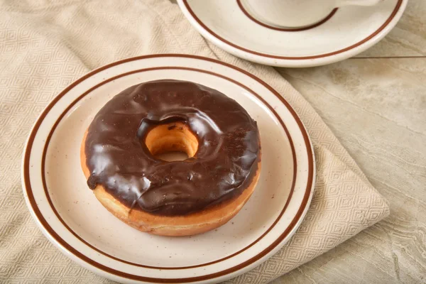 Gourmet chocolate frosted donut — Stock Photo, Image