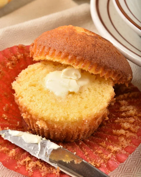 Gourmet cornbread muffin with butter — Stock Photo, Image