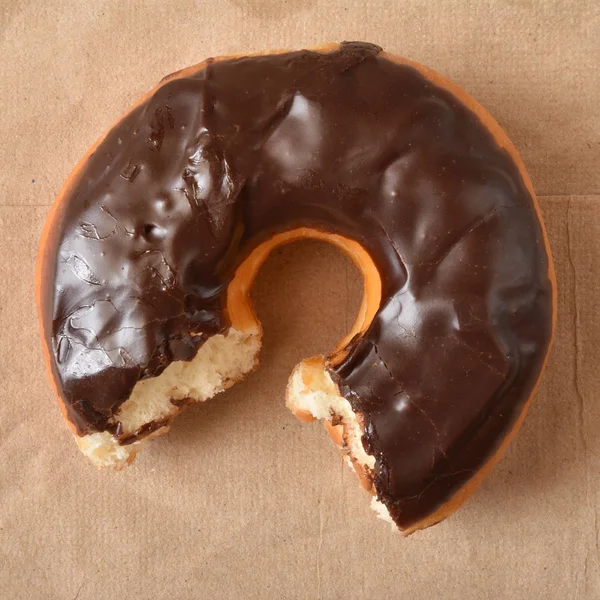 Donut with chocolate frosting — Stock Photo, Image