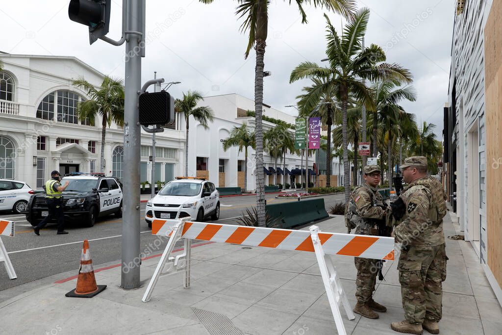 Beverly Hills, CA/USA - National Guard soldiers stand watch on Rodeo Drive after the Black Lives Matter protests where every store in the luxury shopping district was looted