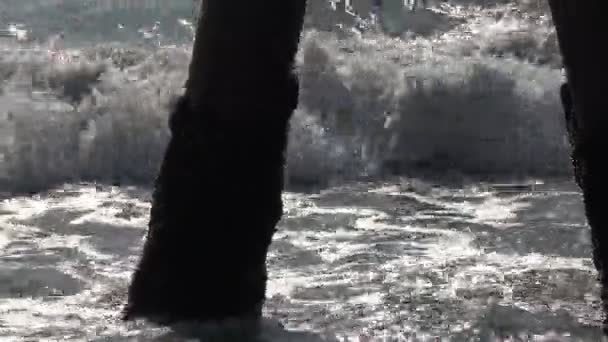 Close Wave Crashing Pier — Stock video