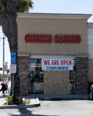 Long Beach, CA/USA -  June 6, 2020: A check cashing store that was looted during the Black Lives Matter protests in Long Beach