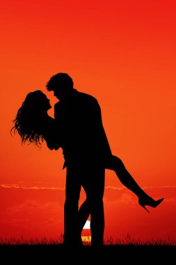 gün batımında romantik çift siluet