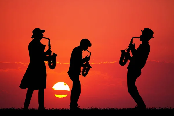 Mężczyzn Grać Saksofonie Zachodzie Słońca — Zdjęcie stockowe