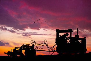 illustration of plow at sunset clipart