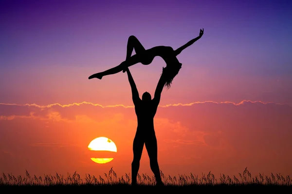 couple dancers at sunset