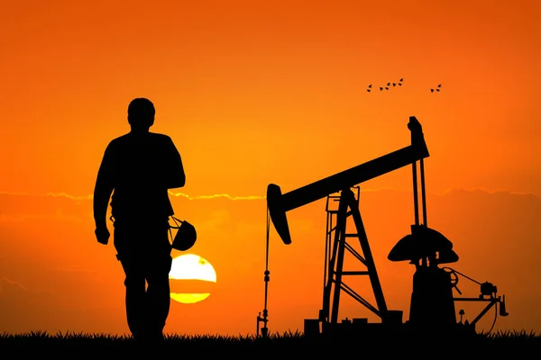 Oil pump silhouette at sunset — Stock Photo, Image