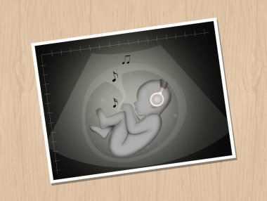 illustration of fetus listening to music clipart