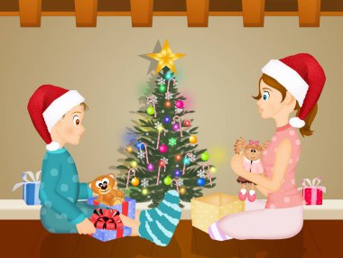 çocuklar Noel ağacının altında hediyeler açmak