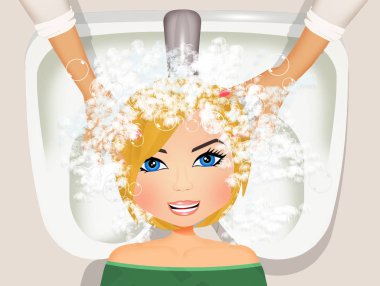 Kadın kuaförde şampuanlanıyor.