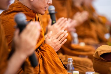 pray of monks of buddhist in Thailand clipart