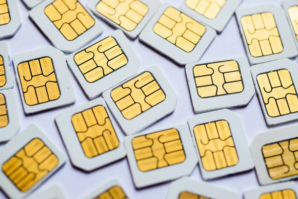Many Micro SIM 3G for mobile over on white background.