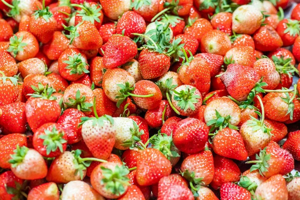 fresh red Strawberry on Fruit tray background in Night Market.