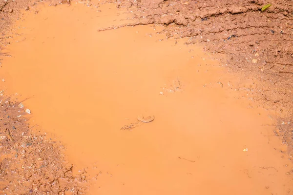 클로즈업 진흙 텍스처 배경, 폭우 후. — 스톡 사진