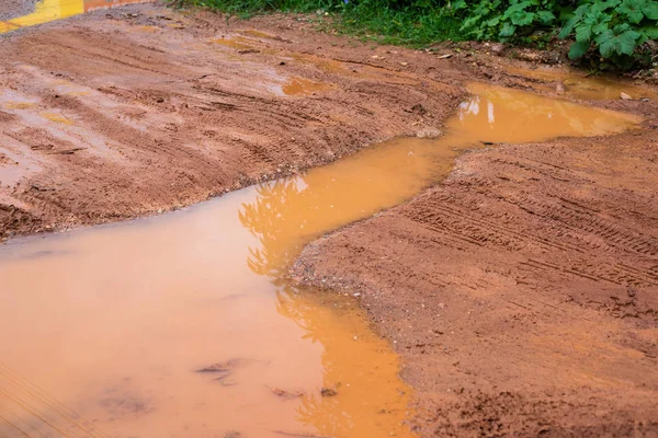 클로즈업 진흙 텍스처 배경, 폭우 후. — 스톡 사진