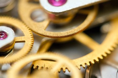 Arka plan ile metal cogwheels saat. Kavramsal fotoğraf 