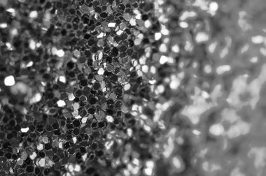 Sparkles güzel Festival glitter. Makro. Soyut siyah ve beyaz arka plan.