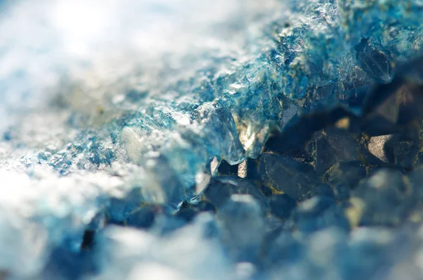 Beautiful texture of Blue crystals. mineral its blurred natural background. Winter Beautiful background. Macro.