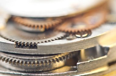 Metal dişli tekerlekli arka plan. Kavramsal fotoğraf başarılı endüstriyel arka plan ve tasarımlar için. Makro.