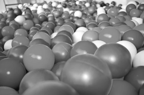 Black grey white balls for dry massage. Black-and-white photo — Stock Photo, Image