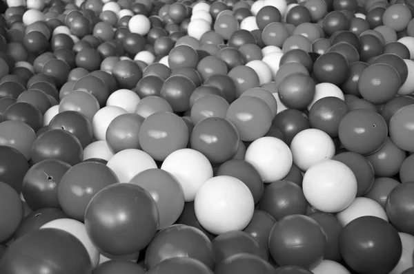 Black grey white balls for dry massage. Black-and-white photo