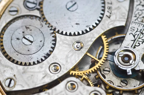 Meccanismo, ingranaggi in un vecchio orologio. Concetto di lavoro di squadra, idea, tecnologia — Foto Stock