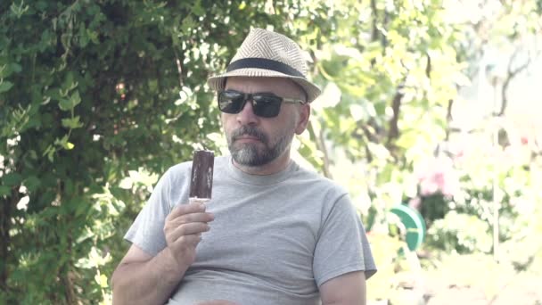 Adult Handsome Man Beard Eating Ice Cream Outdoor — Stock Video